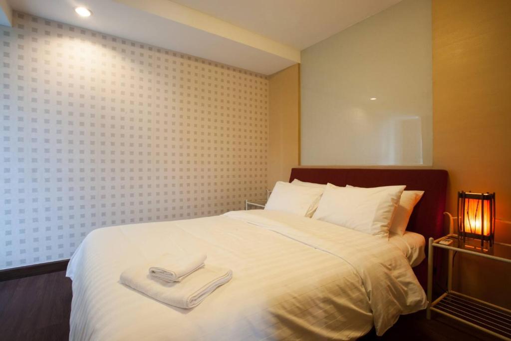 Postel nebo postele na pokoji v ubytování 4D-Lovely 25 Bedrooms Bkk Downtownbtsmrtboat