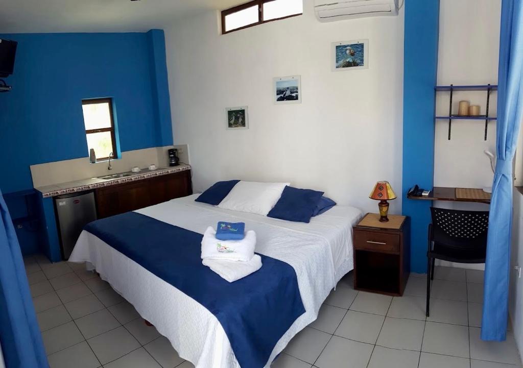 Postel nebo postele na pokoji v ubytování Sun Island