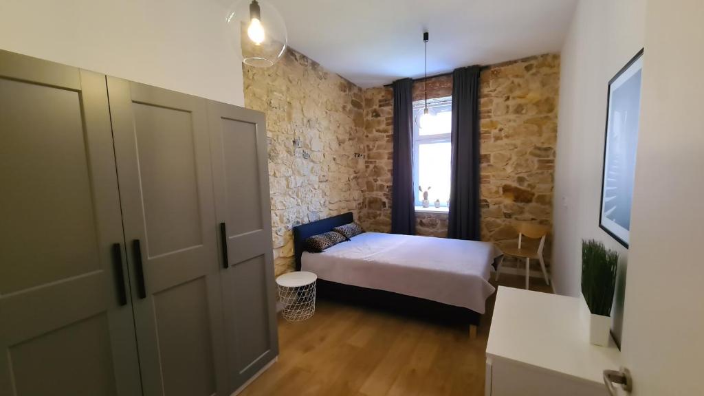 Fotografia z galérie ubytovania Szczytowa Kamienica Apartamenty Blisko Centrum v destinácii Čenstochová