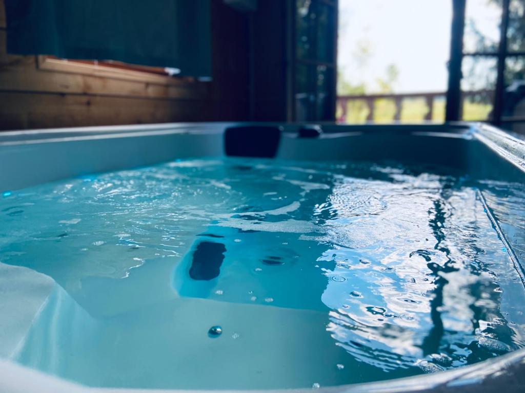 Fotografie z fotogalerie ubytování Chambre avec spa privé v destinaci Candor