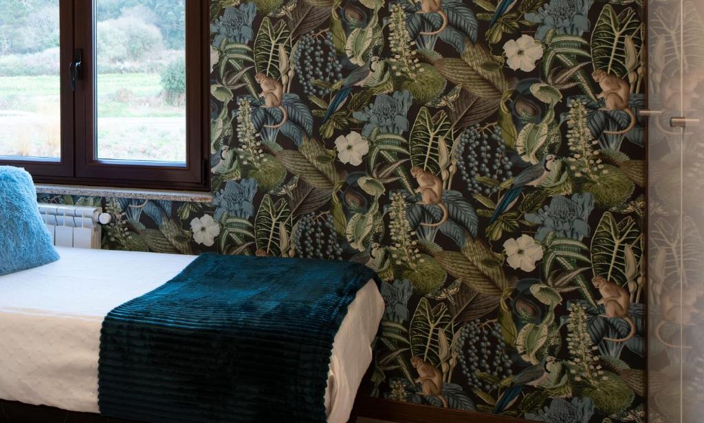 Postel nebo postele na pokoji v ubytování Luxury Singular Villa Carolina
