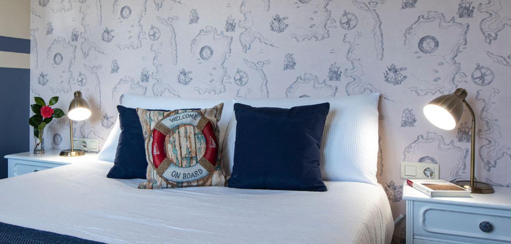 Postel nebo postele na pokoji v ubytování Luxury Singular Villa Carolina