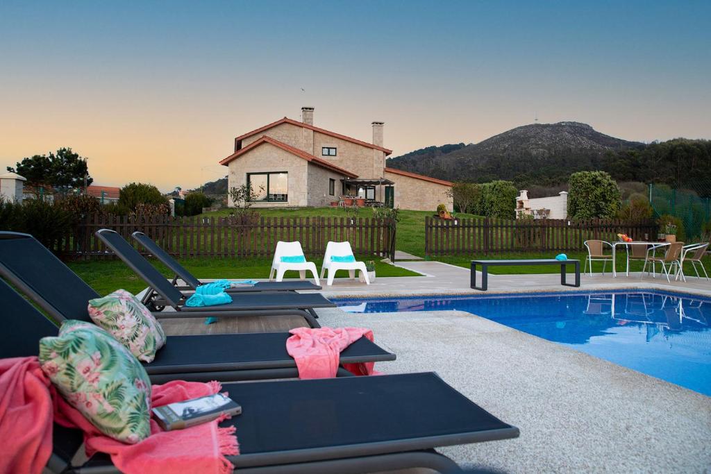 Bazén v ubytování Luxury Singular Villa Carolina nebo v jeho okolí