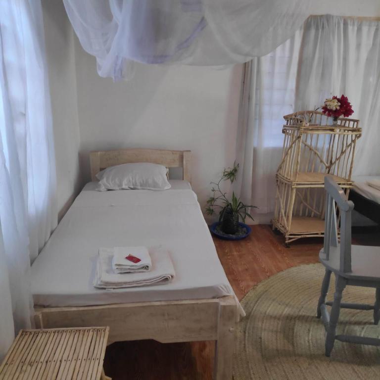 Postel nebo postele na pokoji v ubytování Sunny garden rooms Watamu