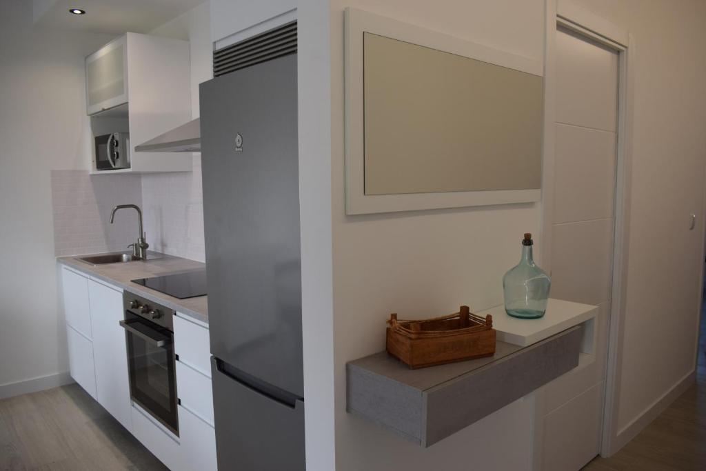 Kuchyň nebo kuchyňský kout v ubytování Apartamento Corcubica mirando al mar