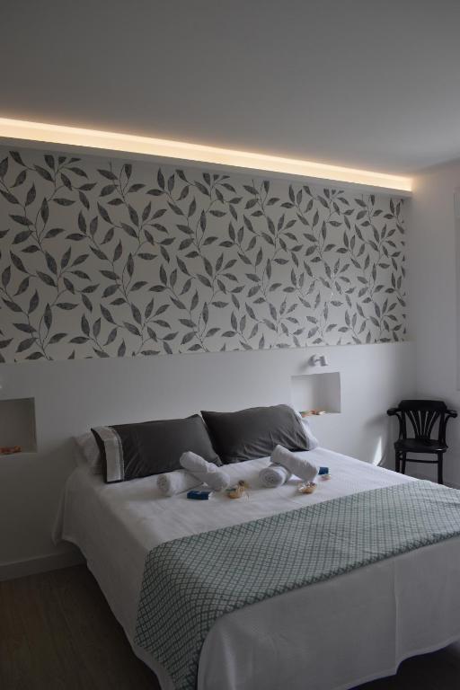 Postel nebo postele na pokoji v ubytování Apartamento Corcubica mirando al mar