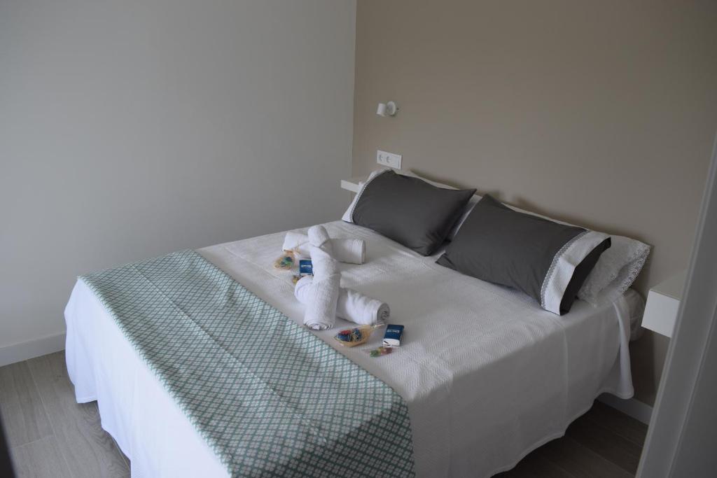 Postel nebo postele na pokoji v ubytování Apartamento Corcubica mirando al mar