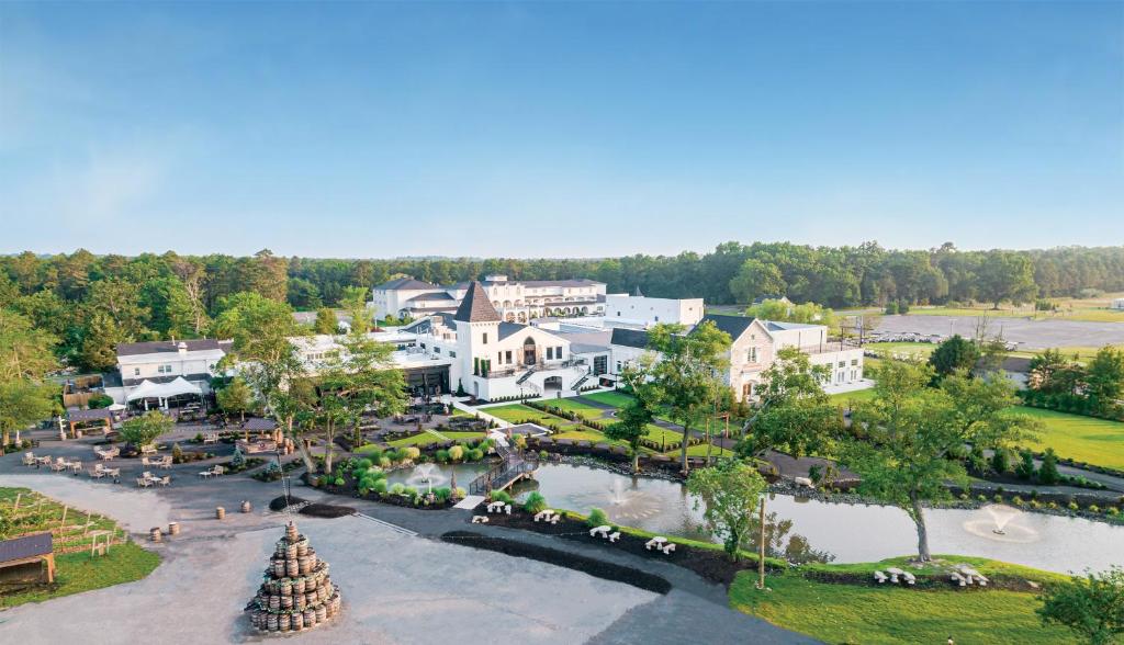 an aerial view of a resort with a pond at Chateau Renault in Egg Harbor City