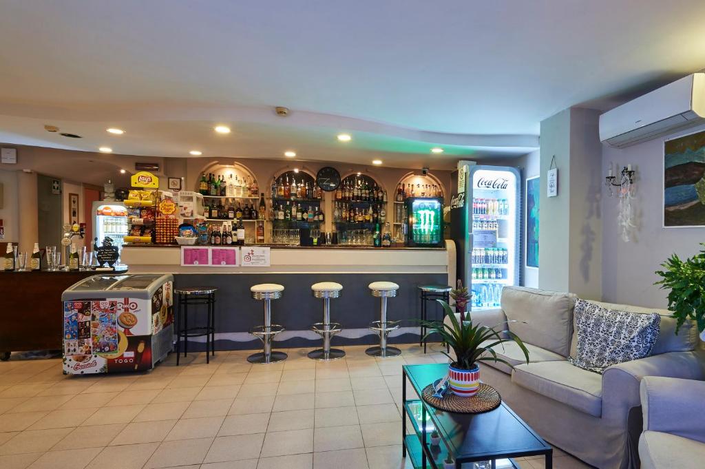 Lounge nebo bar v ubytování Hotel A Casa Nostra