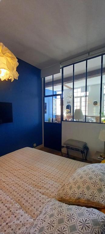 Posteľ alebo postele v izbe v ubytovaní LA ROCHELAISE : Appartement calme & somptueux dans l'hyper centre.