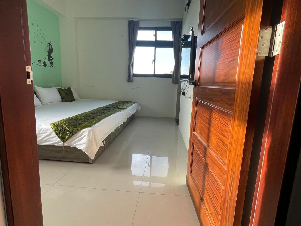 Postel nebo postele na pokoji v ubytování Dandelion Manor