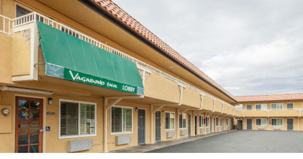 a view of a warden inn sign on a building at Vagabond Inn Hemet in Hemet