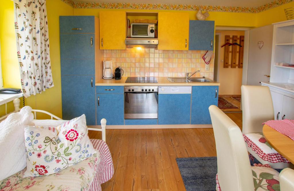 Kuchyň nebo kuchyňský kout v ubytování Appartements Kaiserblick