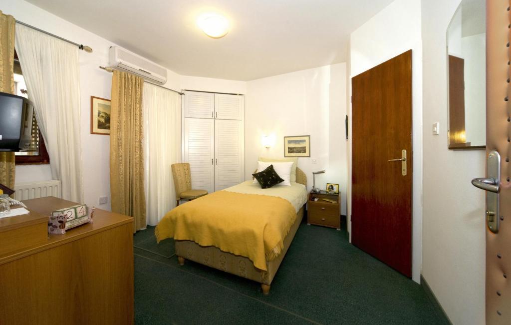 Postel nebo postele na pokoji v ubytování Halvat Guesthouse