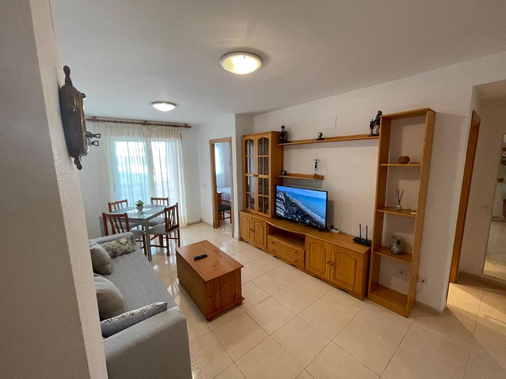 TV a/nebo společenská místnost v ubytování Acapulco III Marina DOR Beach front - Sea views