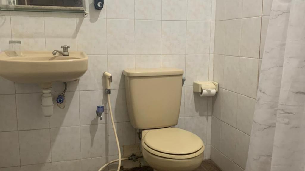 Koupelna v ubytování Indraprastha 2 Bungalow