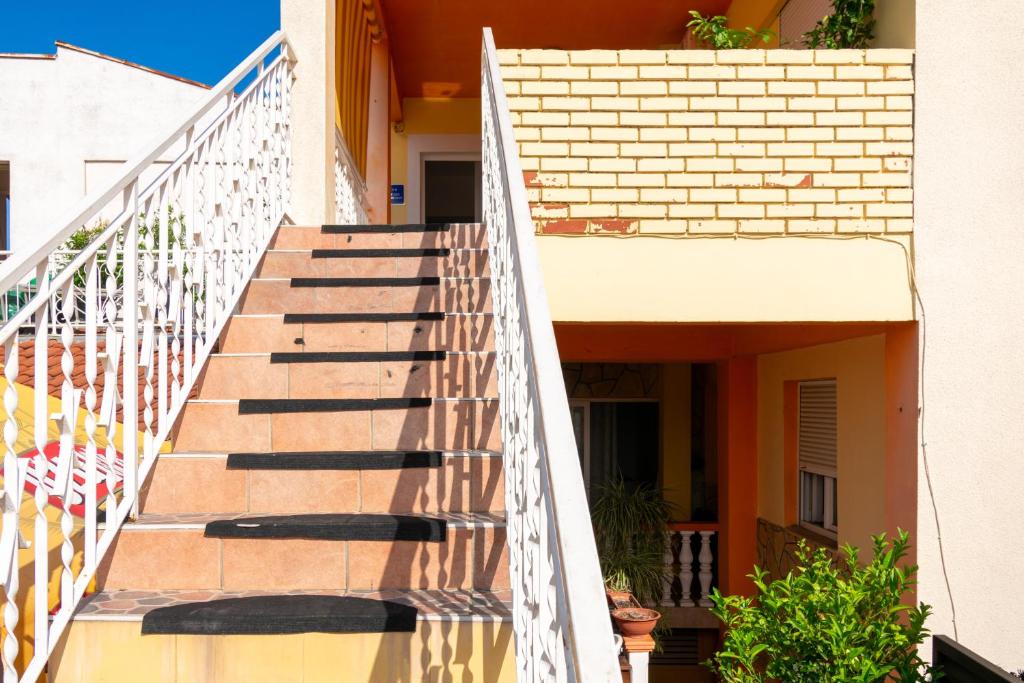 a stairway leading up to a building at Apartments with a parking space Bibinje, Zadar - 18275 in Bibinje