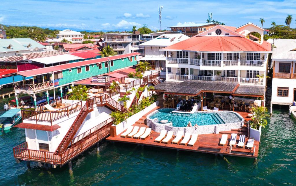 an aerial view of a resort on the water at Tropical Suites Hotel in Bocas del Toro