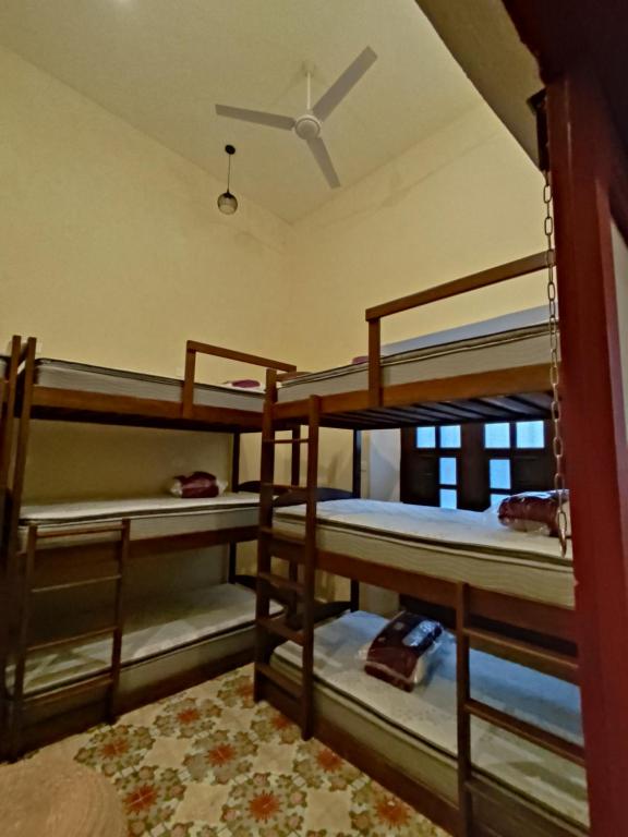 Postel nebo postele na pokoji v ubytování MELISA HOSTAL