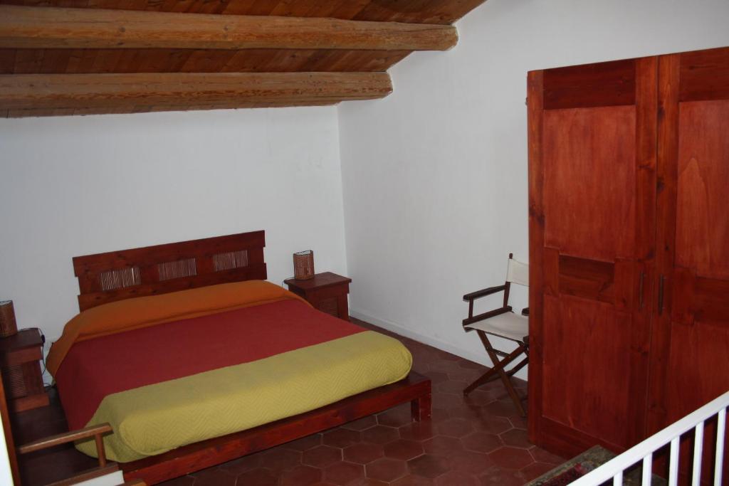 A bed or beds in a room at La Chiave di Volta