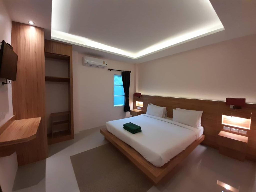 Postel nebo postele na pokoji v ubytování Khaolak Yama Resort - SHA Plus