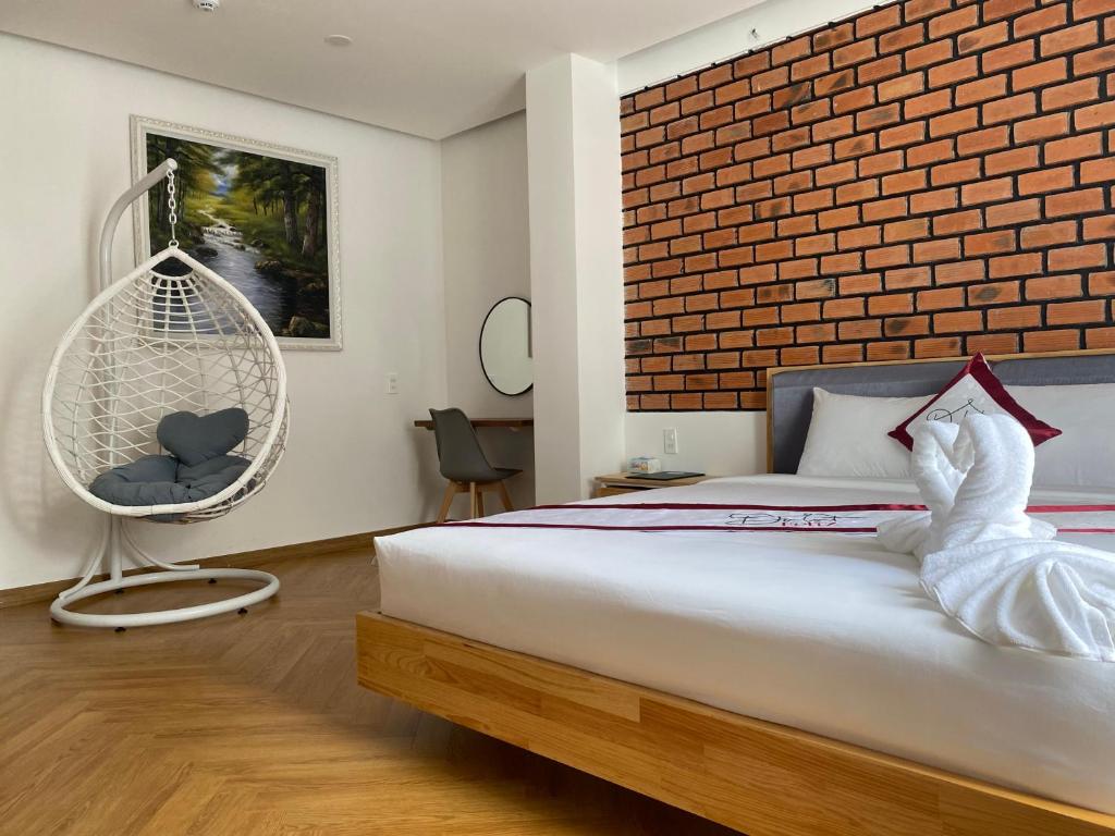 Giường trong phòng chung tại Feliz Dalat Homestay