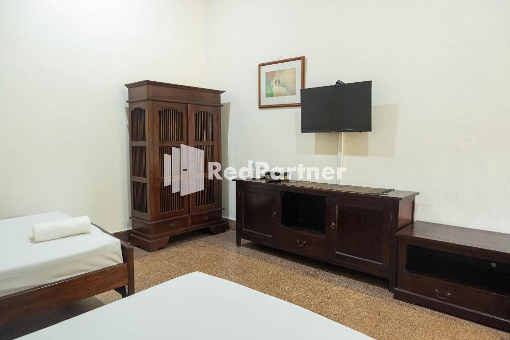 Urbanview Monginsidi Heritage Yogyakarta - Chambre Lits Jumeaux De Luxe