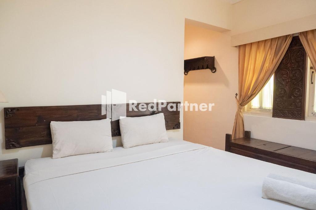 Urbanview Monginsidi Heritage Yogyakarta - Chambre Double Standard