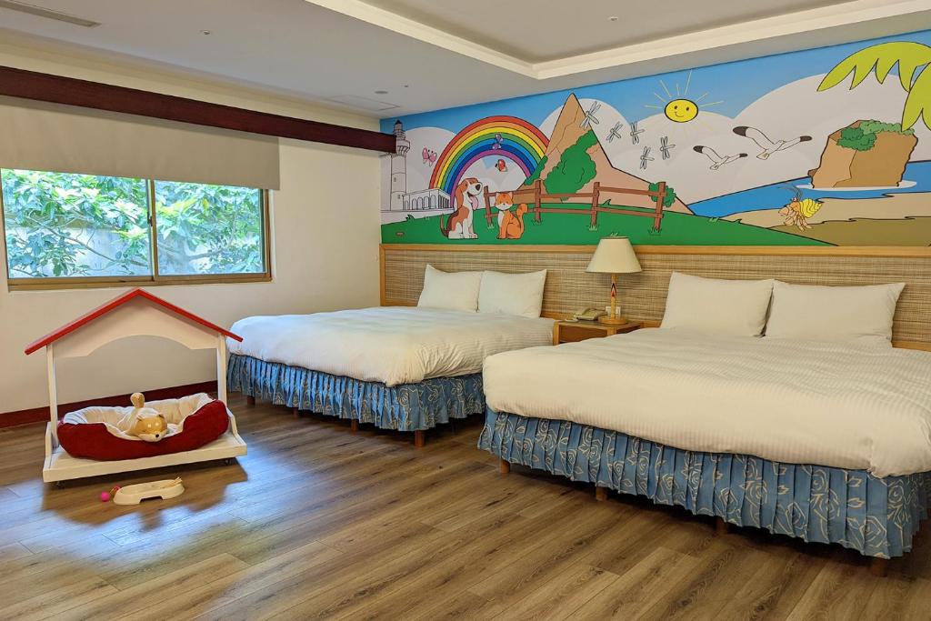 A bed or beds in a room at Howard Kenting Wonder House