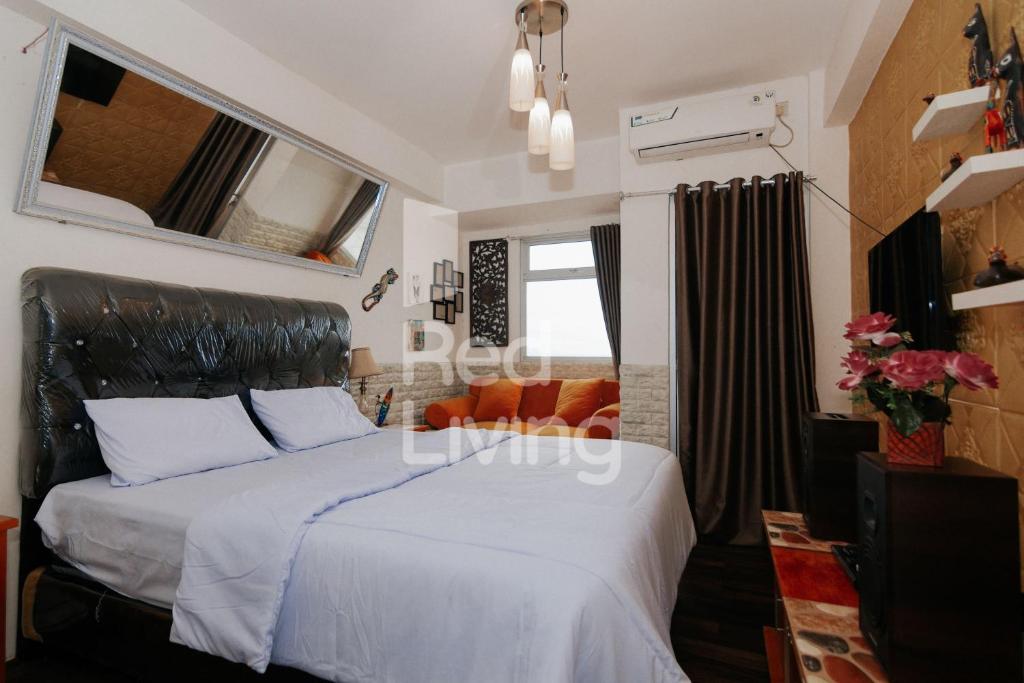 RedLiving Apartemen Gunung Putri Square – TOP Room