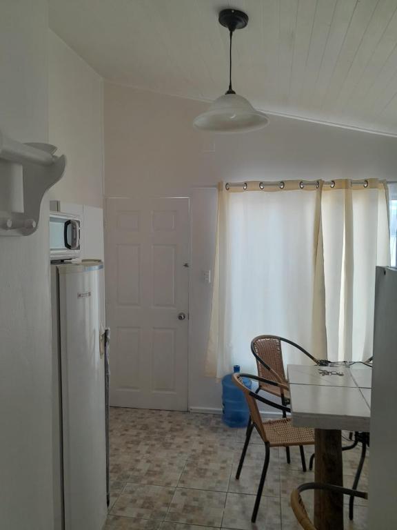 Kuchyň nebo kuchyňský kout v ubytování Cabanas bahia inglesa