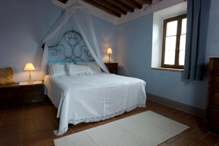 Posteľ alebo postele v izbe v ubytovaní Agriturismo Podere Costarella
