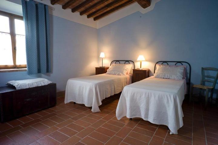 Posteľ alebo postele v izbe v ubytovaní Agriturismo Podere Costarella