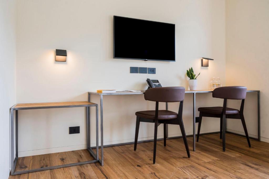 TV a/nebo společenská místnost v ubytování Bihotel