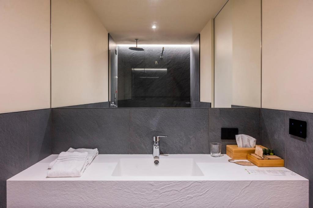 Koupelna v ubytování Bihotel