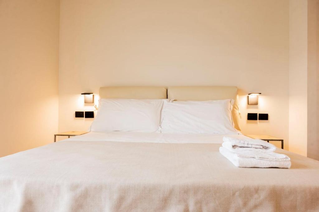 Postel nebo postele na pokoji v ubytování Bihotel