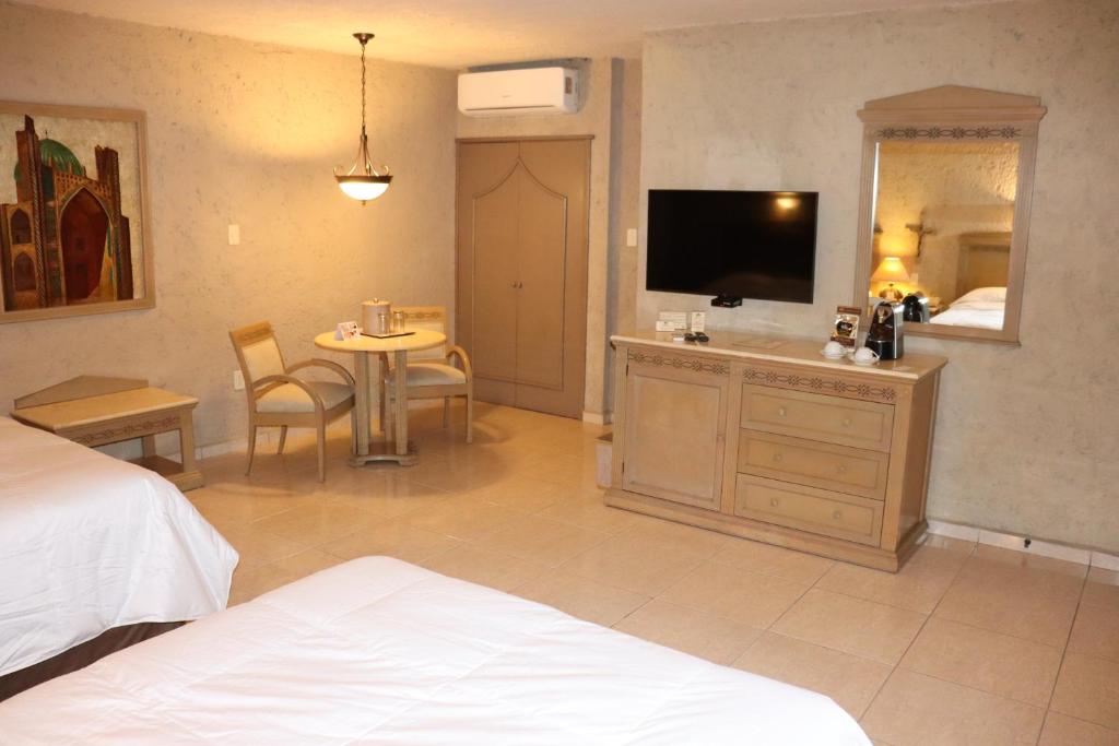 TV a/nebo společenská místnost v ubytování Suites Layfer, Córdoba, Veracruz, México