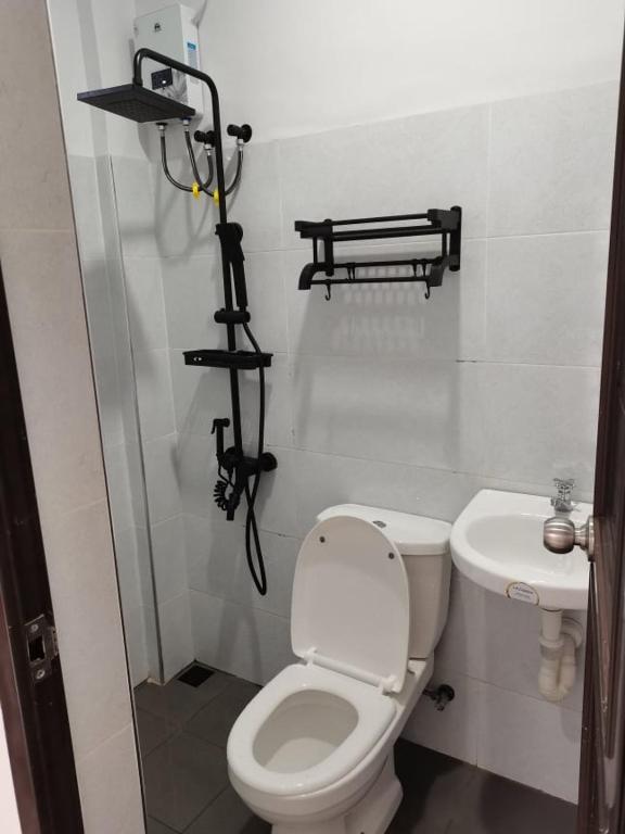 Koupelna v ubytování Jkenter Suites