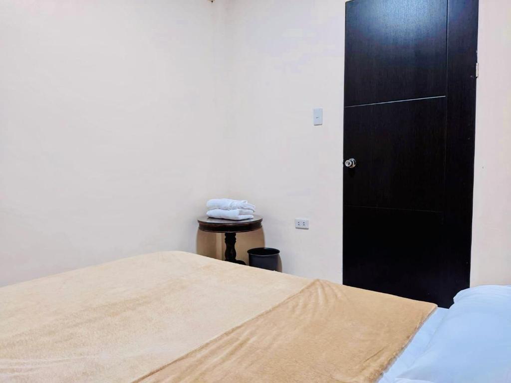 Postel nebo postele na pokoji v ubytování ABIZA Homestay