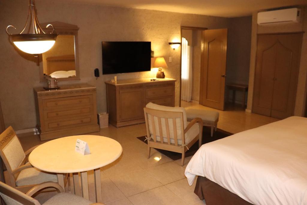 TV a/nebo společenská místnost v ubytování Suites Layfer, Córdoba, Veracruz, México