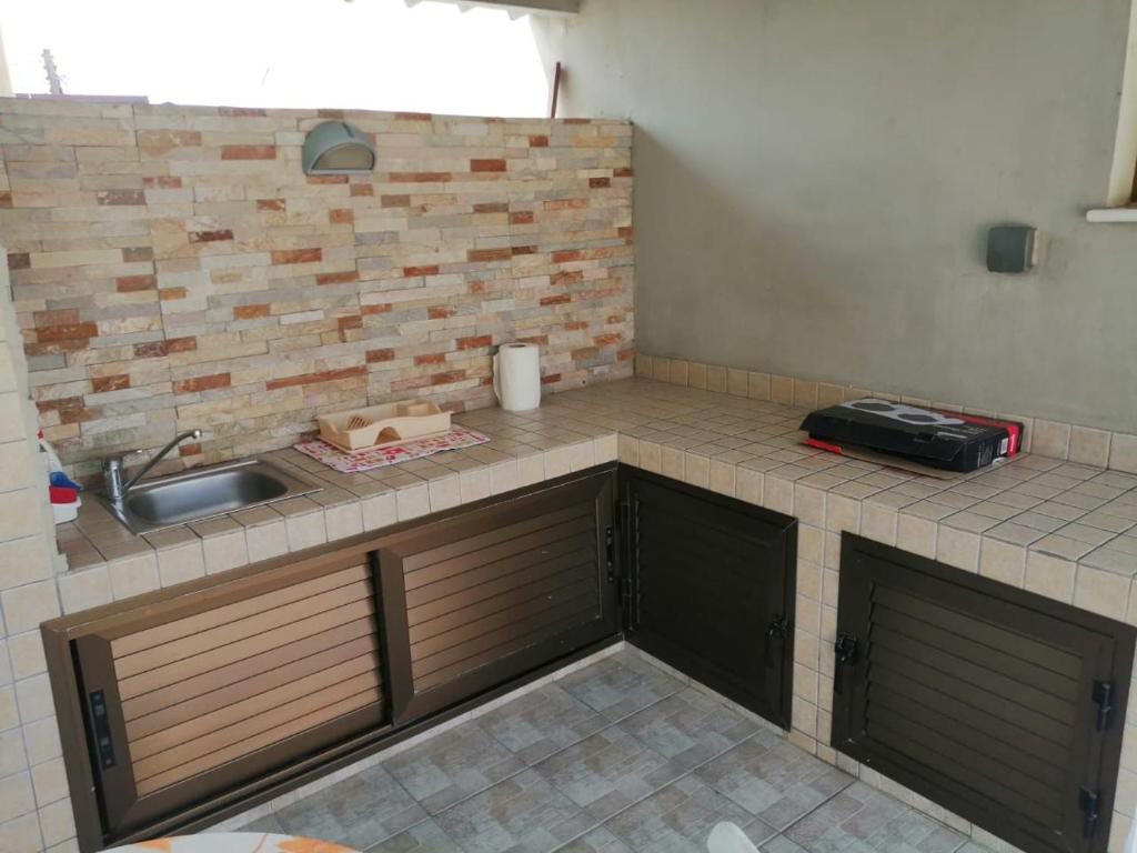 Kuchyň nebo kuchyňský kout v ubytování Extremely comfy apt with spacious private terrace 10min walk to the beach & in Town