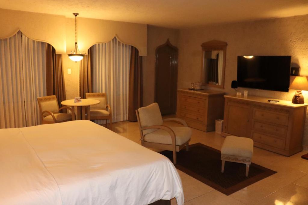 TV a/nebo společenská místnost v ubytování Suites Layfer, Córdoba, Veracruz, México