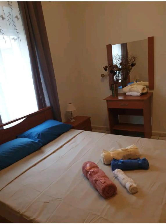 Posteľ alebo postele v izbe v ubytovaní Dimitri's house