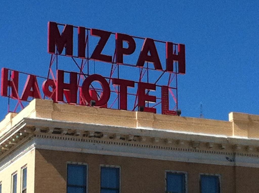 a large sign on the top of a building at Mizpah Hotel in Tonopah