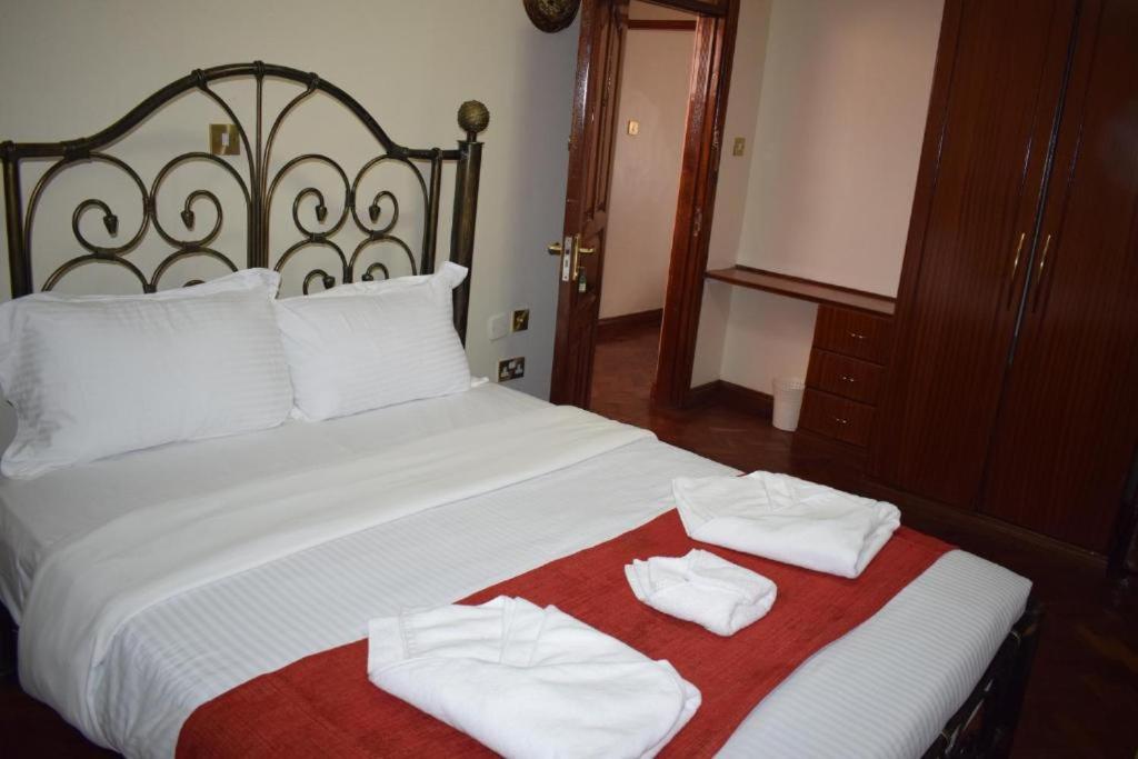 Postel nebo postele na pokoji v ubytování Sochati Casa Resort