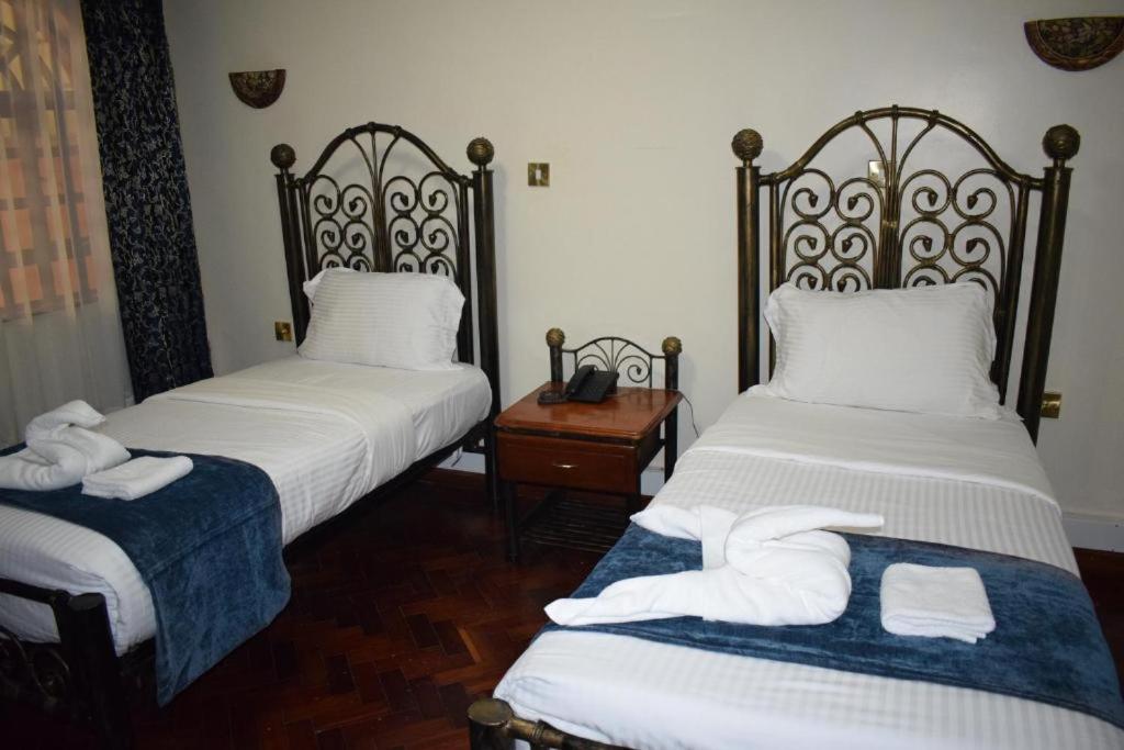 Postel nebo postele na pokoji v ubytování Sochati Casa Resort