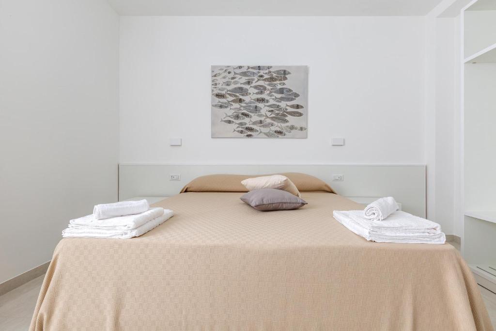 Postel nebo postele na pokoji v ubytování Stella del Mare Rooms