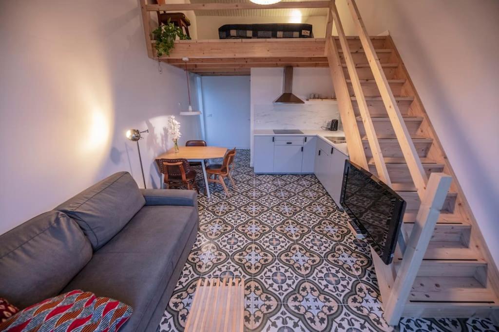Posezení v ubytování 't Winkeltje - Vakantiehuisje op boerderij Huize Blokland