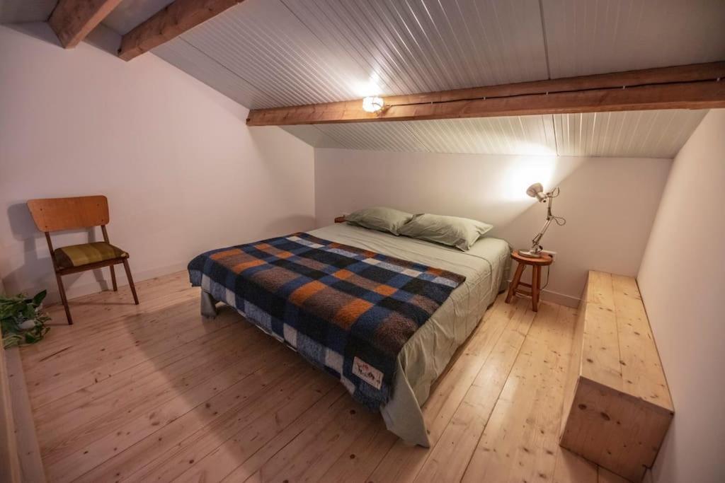 Postel nebo postele na pokoji v ubytování 't Winkeltje - Vakantiehuisje op boerderij Huize Blokland