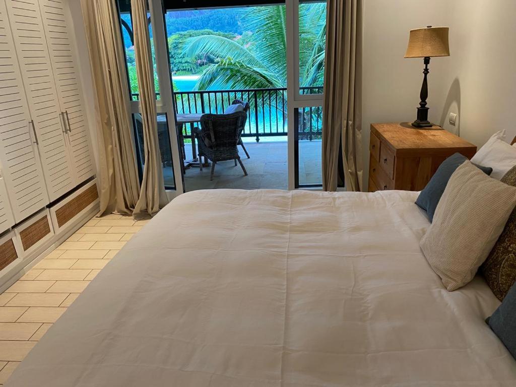 Postel nebo postele na pokoji v ubytování Maison La Plage by Simply-Seychelles